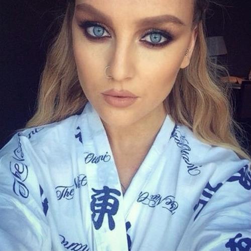 Perrie Edwards taking a selfie