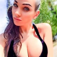 Kristina Basham in a bikini taking a selfie