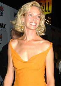 Uma Thurman in an orange dress