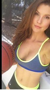 Amanda Cerny in a bikini taking a selfie