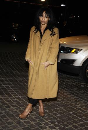 Zoe Kravitz in a long jacket and high heels