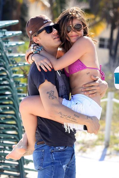 Lucy Hale and Ashley Benson photoshoot at the Bondo Bikini Shack on Miami Beach on March 24, 2012