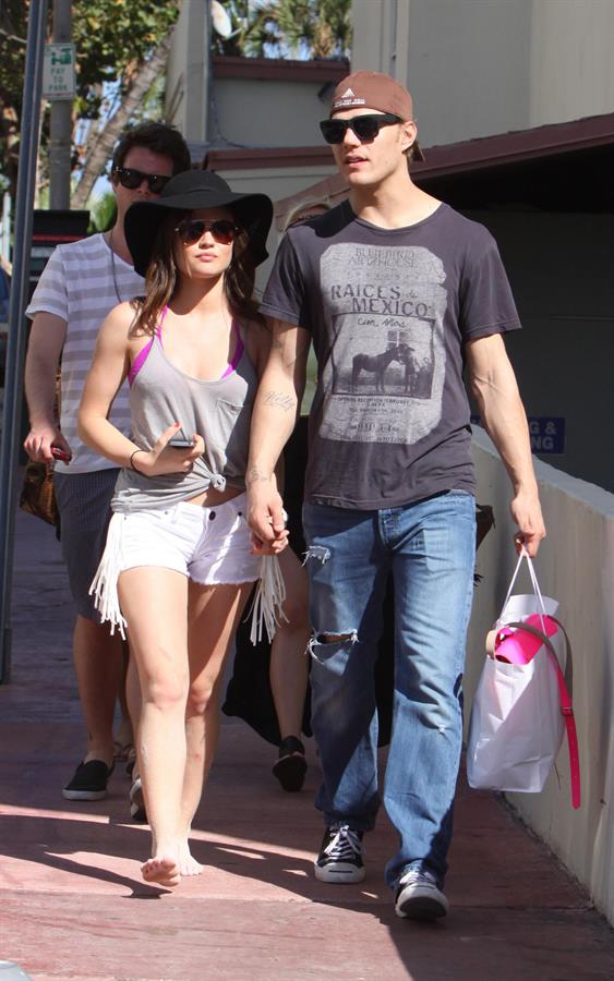 Lucy Hale and Ashley Benson photoshoot at the Bondo Bikini Shack on Miami Beach on March 24, 2012