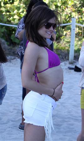 Lucy Hale and Ashley Benson photoshoot at the Bondo Bikini Shack on Miami Beach on March 24, 2012