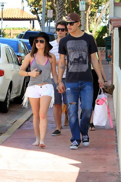 Lucy Hale and Ashley Benson photoshoot at the Bondo Bikini Shack on Miami Beach on March 24, 2012