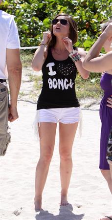 Lucy Hale and Ashley Benson photoshoot at the Bondo Bikini Shack on Miami Beach on March 24, 2012