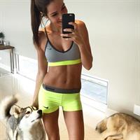 Kayla Itsines taking a selfie