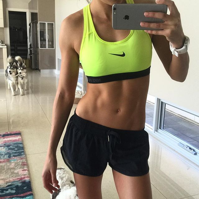 Kayla Itsines taking a selfie