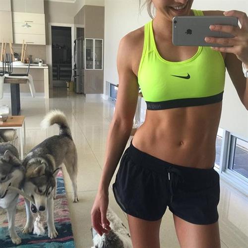 Kayla Itsines taking a selfie