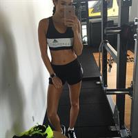 Kayla Itsines taking a selfie