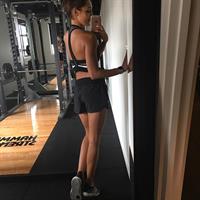 Kayla Itsines taking a selfie