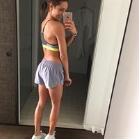 Kayla Itsines taking a selfie