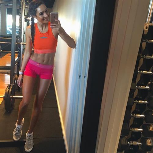 Kayla Itsines taking a selfie