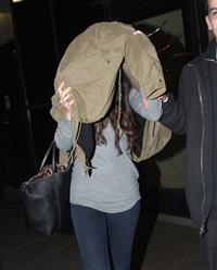 Selena Gomez arrives on a flight at Los Angeles Airport December 21, 2012 