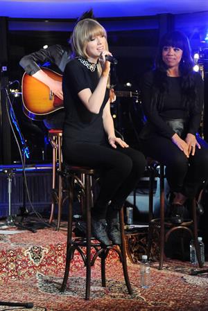 Taylor Swift performs at a private concert for NRJ on a barge on The Seine January 28, 2013 