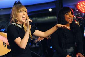 Taylor Swift performs at a private concert for NRJ on a barge on The Seine January 28, 2013 