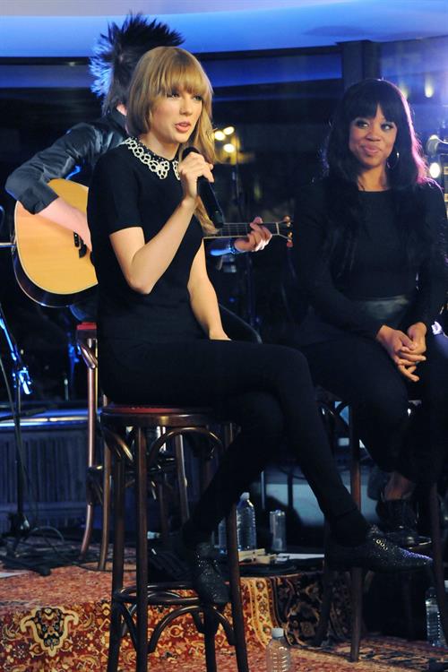 Taylor Swift performs at a private concert for NRJ on a barge on The Seine January 28, 2013 