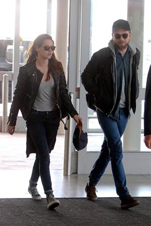 Kristen Stewart - Arrives at John F. Kennedy International Airport in New York City (8/5/2013) 