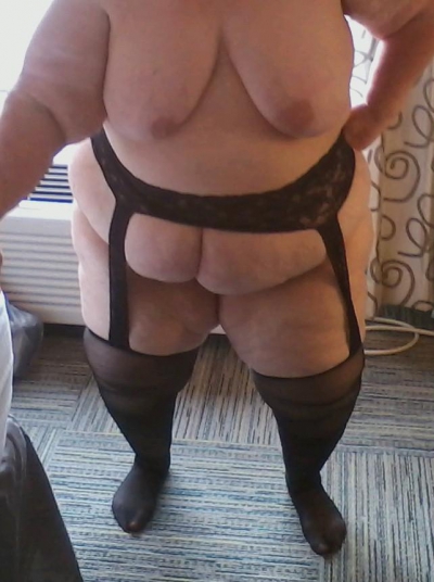 krc48dd Nude. Just me wearing a garter belt and stockings and showing my big,  natural, 48DD tits. This picture of me was taken in a hotel in front of an  open window.