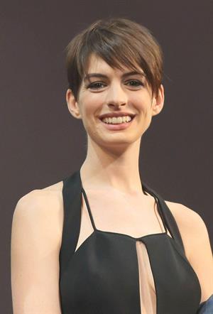 Anne Hathaway poses for photographers during an event to promote their latest movie 'Les Miserables' in Tokyo