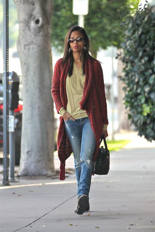 Zoe Saldana out and about in West Hollywood wearing a long red sweater coat January 19-2012 