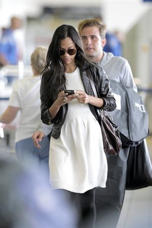 Zoe Saldana boarding an Alaska Airlines flight at LA Airport June 2nd 2009  