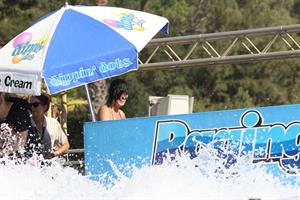Katy Perry talks with a group of her friends after spending the afternoon at Raging Waters in San Dimas, California on August 12, 2012
