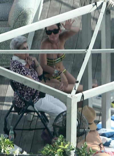 Katy Perry - In a bikini at a hotel pool in Miami July 27, 2012
