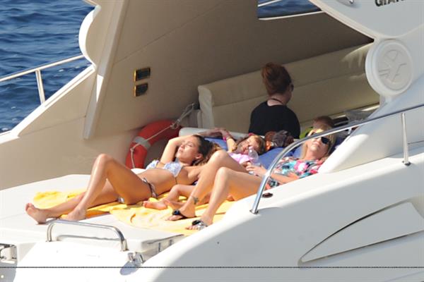 Jessica Alba sunbathing in a bikini on a boat 13 07 12 