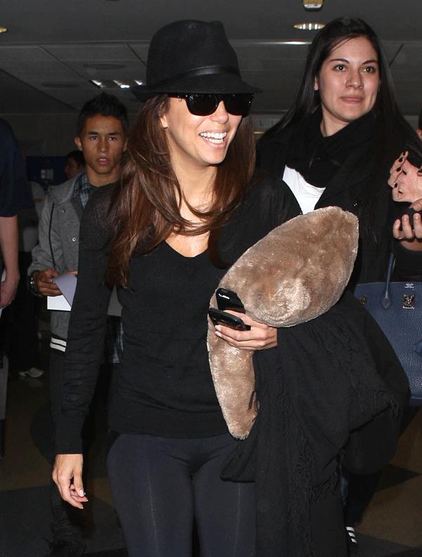 Eva Longoria catches a flight at Los Angeles International Airport (13.02.2013) 