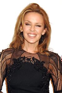 Kylie Minogue in a tight black mini dress for the launching of her book 'Kylie Fashion' at Saks Fifth Avenue