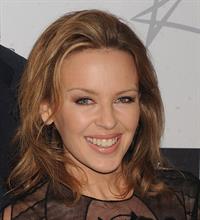 Kylie Minogue in a tight black mini dress for the launching of her book 'Kylie Fashion' at Saks Fifth Avenue