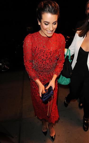 Lea Michele outside in a red dress at night