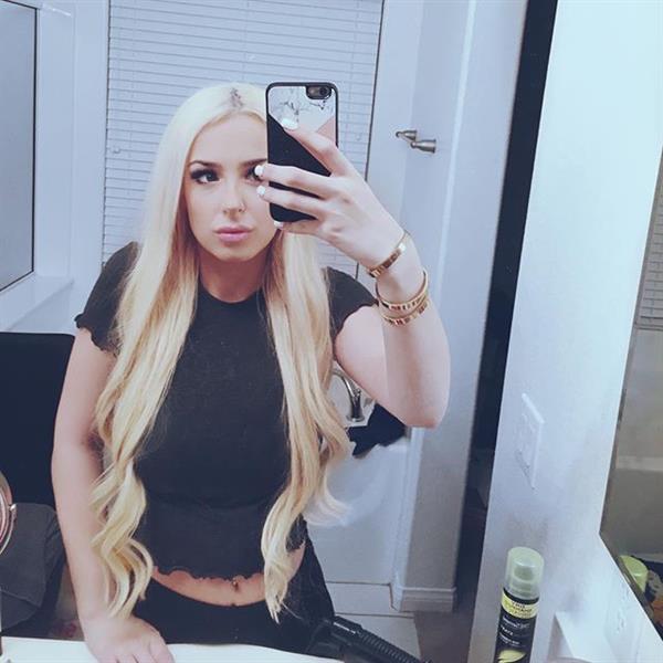 Tana Mongeau taking a selfie