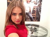 Xenia Tchoumitcheva taking a selfie