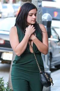 Ariel Winter shows cleavage while on a walk