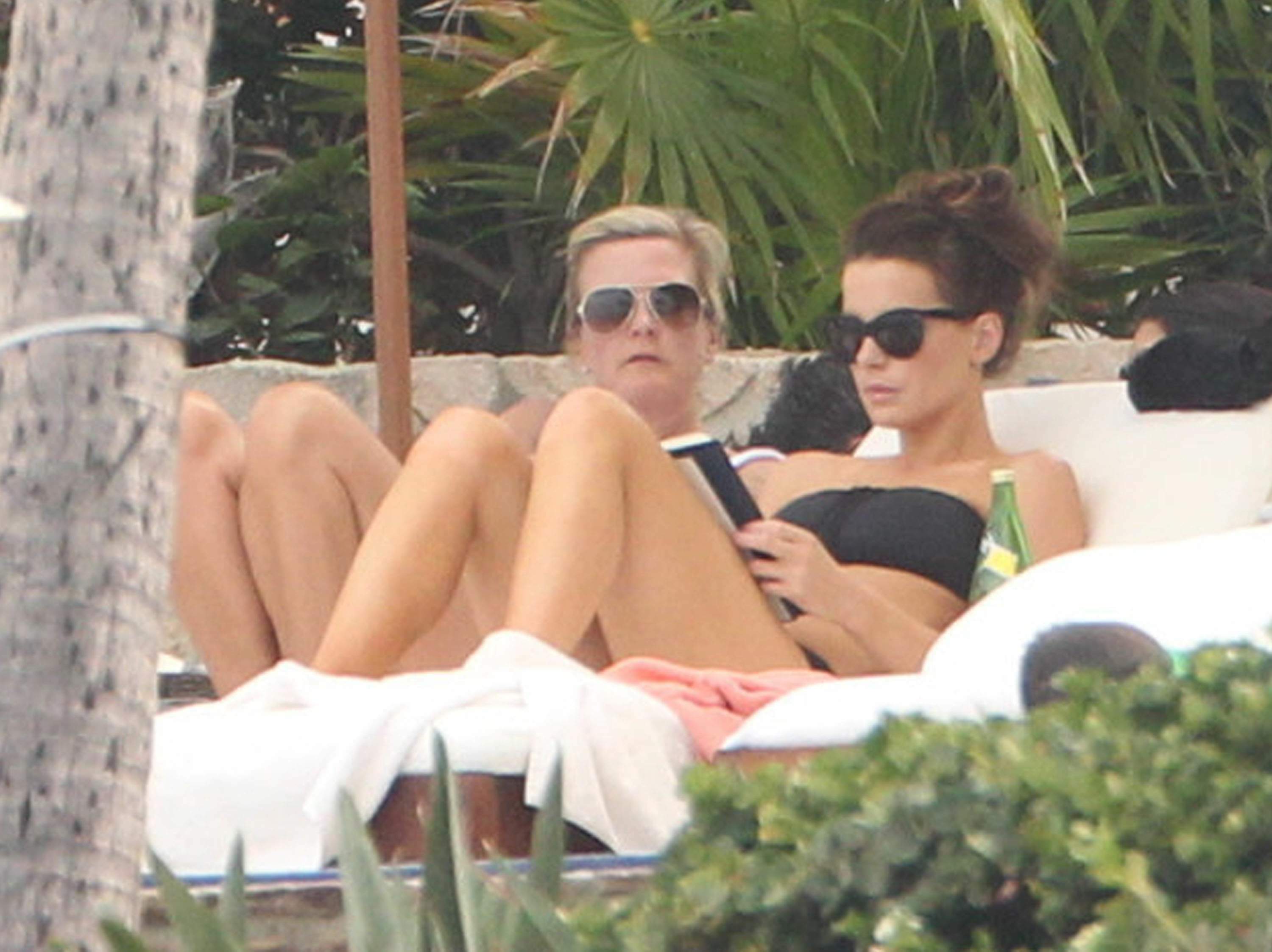 Kate Beckinsale in bikini as she fits in some sunbathing on family holiday in Mexico March 28-2013 