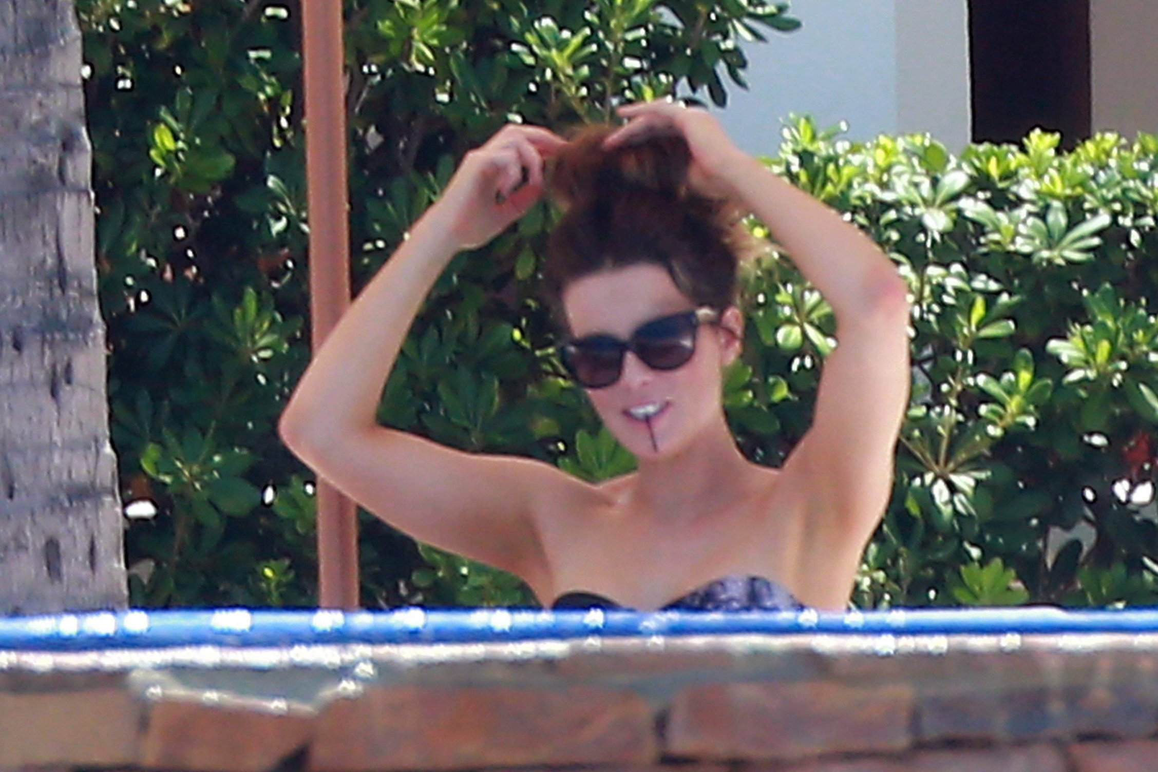 Kate Beckinsale wearing a bikini on vacation in Mexico August 21, 2013