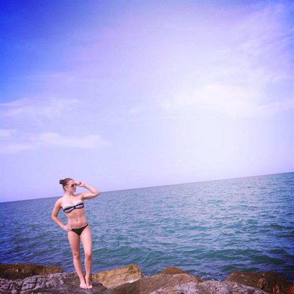 Aliya Mustafina in a bikini