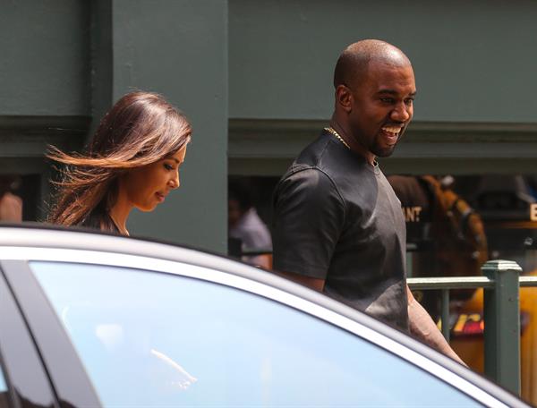 Kim Kardashian and Kanye West walk around SoHo in New York City 