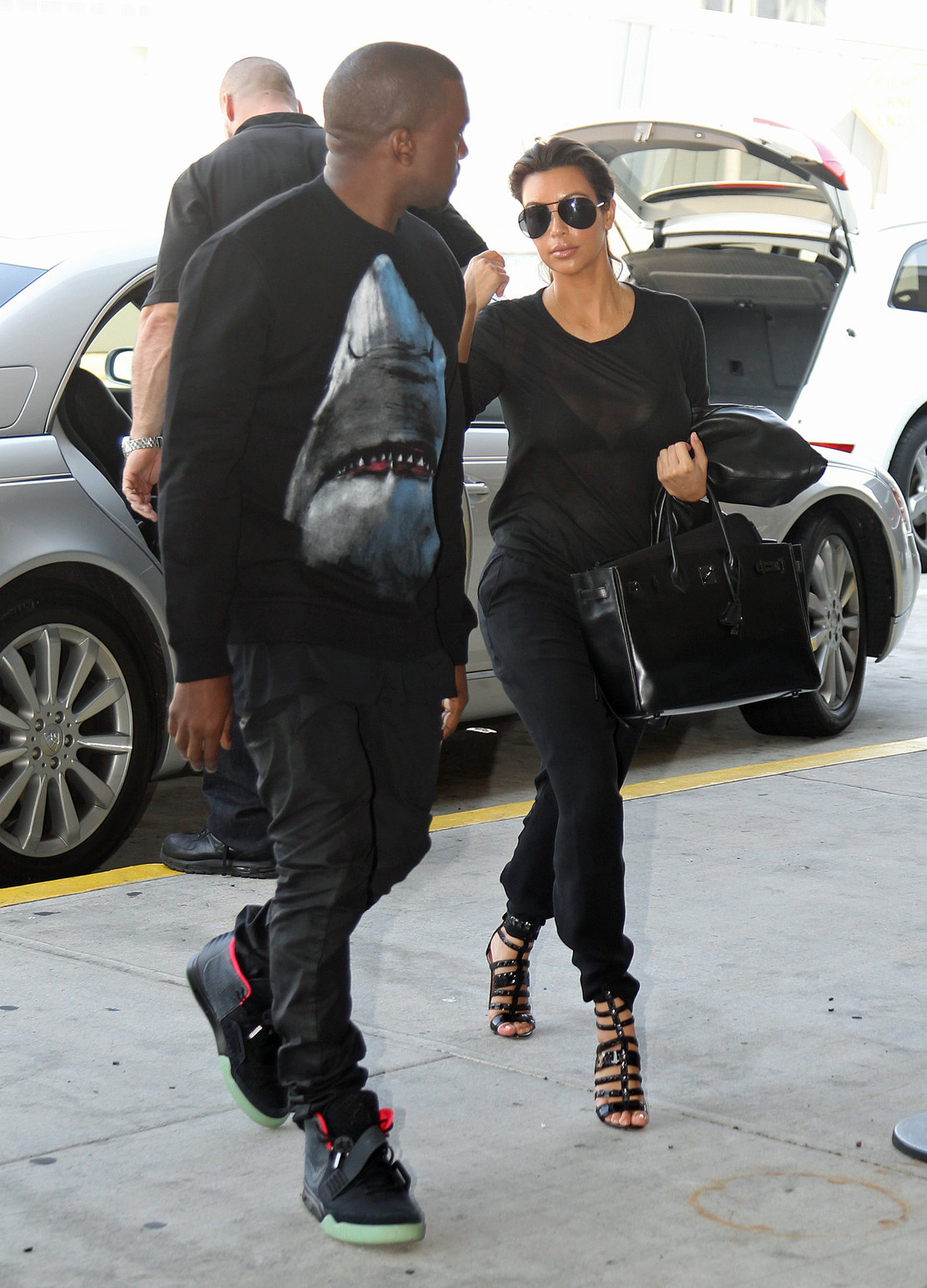 Kim Kardashian and Kanye West JFK airport in New York - 09 August 2012 