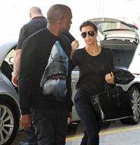 Kim Kardashian and Kanye West JFK airport in New York - 09 August 2012 