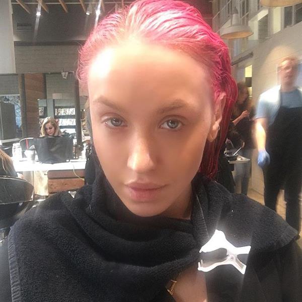 Imogen Anthony taking a selfie