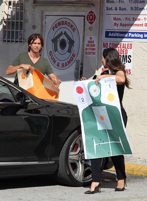 Kim Kardashian Spending the afternoon at the range with friend Jonathan Cheban in Miami (November 2, 2012) 