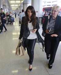 Kim Kardashian catches a flight out of Miami October 4, 2012 