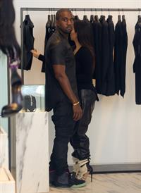 Kim Kardashian and boyfriend Kanye West walk around SoHo in New York City. They stopped at Alexander Wang to do some shopping. August 8, 2012