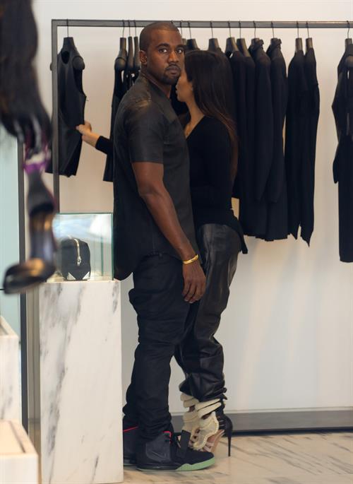 Kim Kardashian and boyfriend Kanye West walk around SoHo in New York City. They stopped at Alexander Wang to do some shopping. August 8, 2012