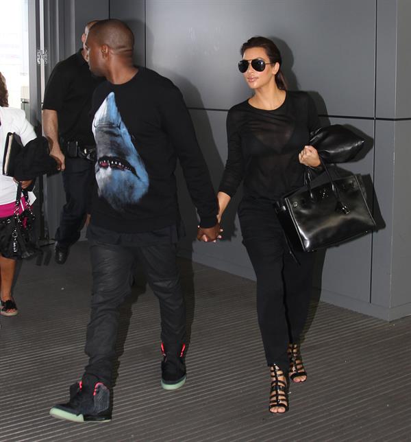 Kim Kardashian - JFK airport in New York on August 9, 2012