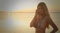 2013 Sports Illustrated Swimsuit Edition.  Kate Upton in body paint