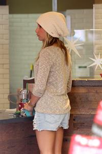 Ashley Tisdale leaving Barneys New York in Los Angeles 11/26/12 